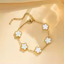 The stainless steel double-sided bracelet with five-leaf petals and gold-plated clovers